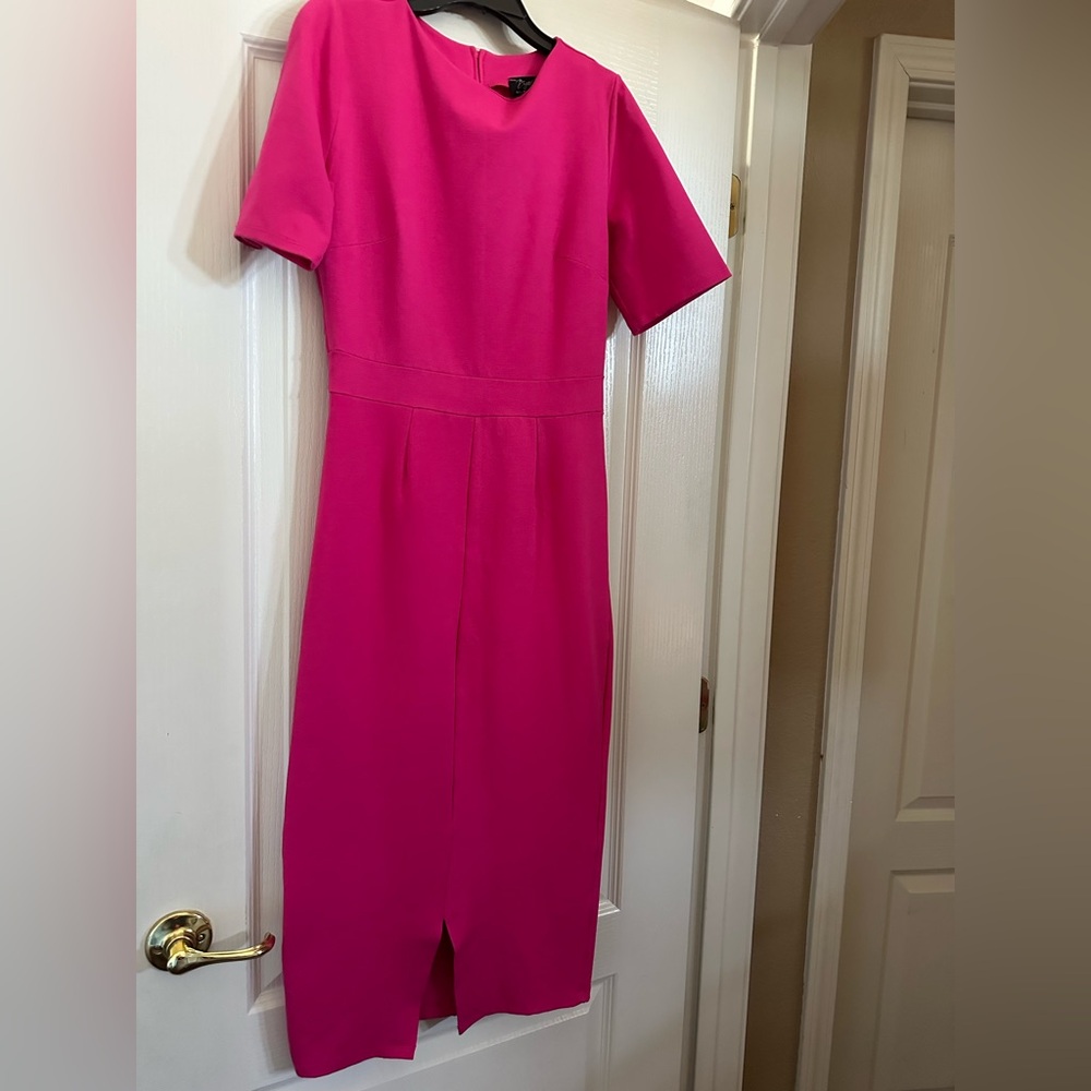 Brigitte Brianna Hot Pink midi low cut midi dress

Pencil cut style
Fits XS/S